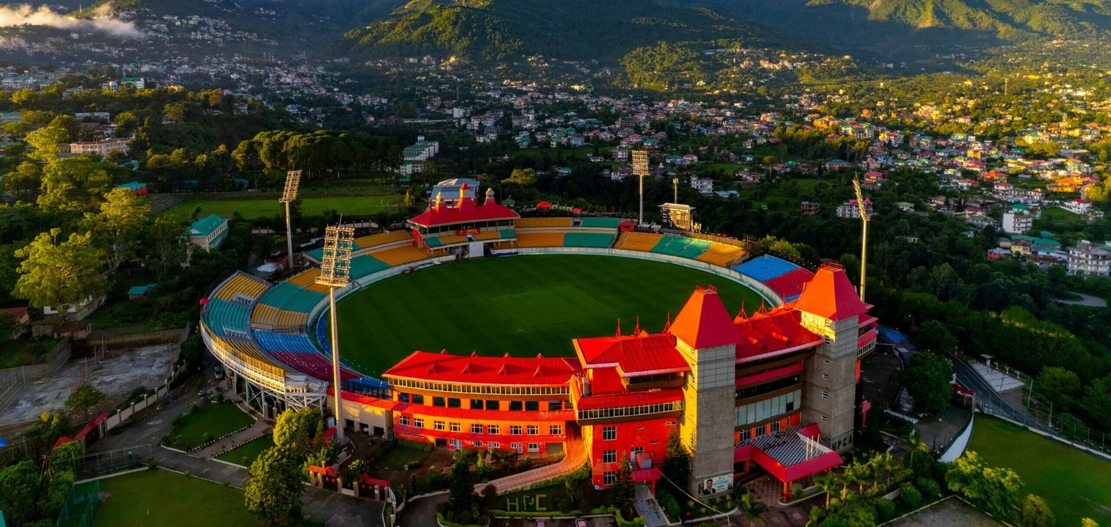 HPCA Dharamshala Stadium and the Dhauladhar peaks